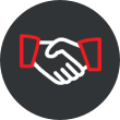 Two hands shaking with red jacket cuffs on a dark circle background. Represents partnership, agreements, or trusted business relationships